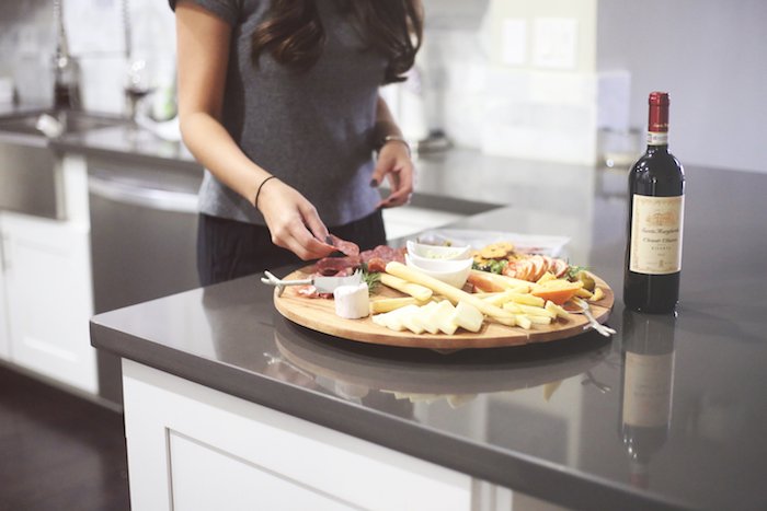 Last-minute holiday entertaining tips: throw together a quick charcuterie board! Click to see even more holiday entertaining tips to impress out of town guests.