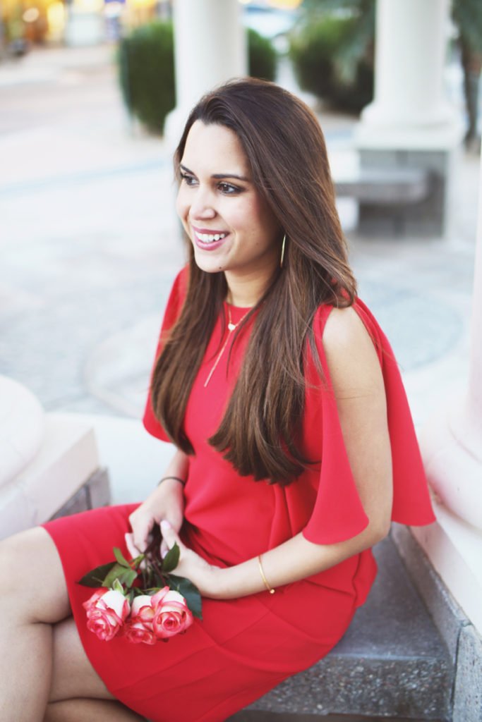 Red cocktail dress and gold accessories. This red cocktail dress is under $100! Perfect for Valentine's Day or date night outfit idea. Click to see the rest of the outfit.