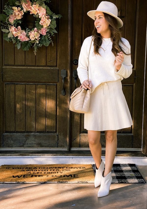 cream skirt with cream sweater and cream booties outfit ysl loulou bag