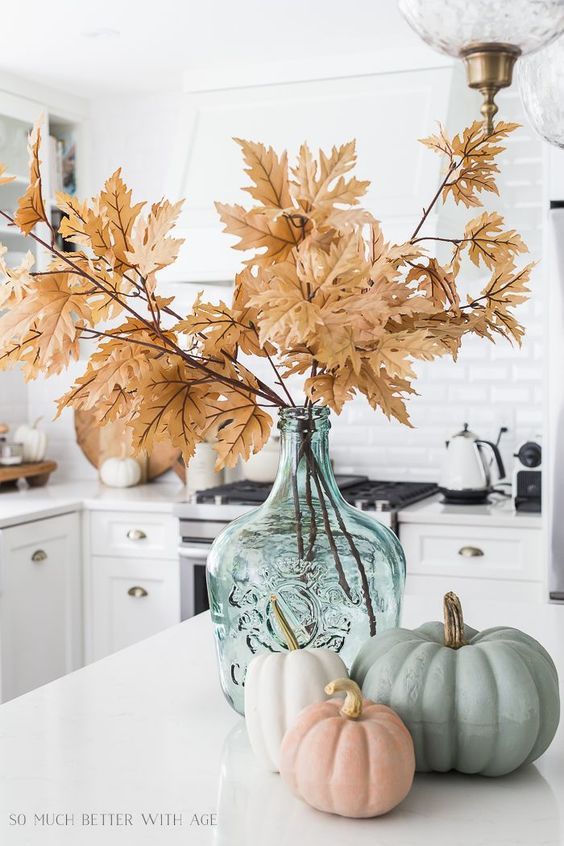 kitchen island decor for fall foiage and pumpkins