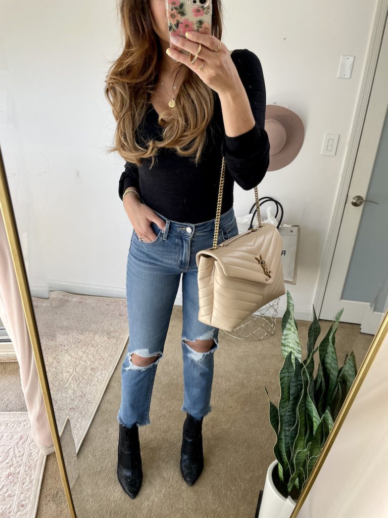 cute mom jeans levis and black bodysuit outfit with ankle boots