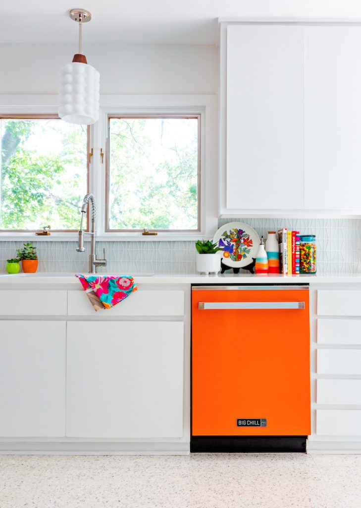 white kitchen cabinets with aqua backsplash and bright appliances 