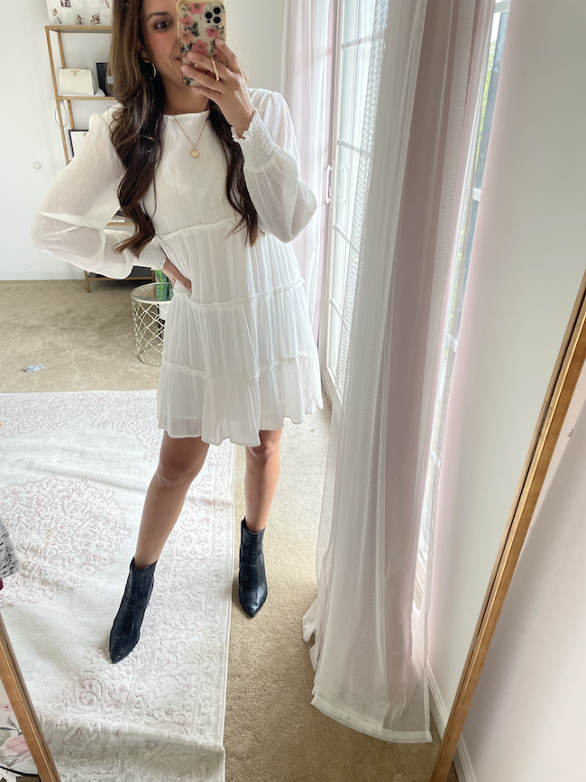 white dress for fall outfit with black ankle boots