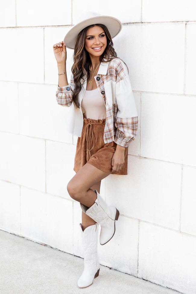 fall outfit with plaid shacket and rust shorts