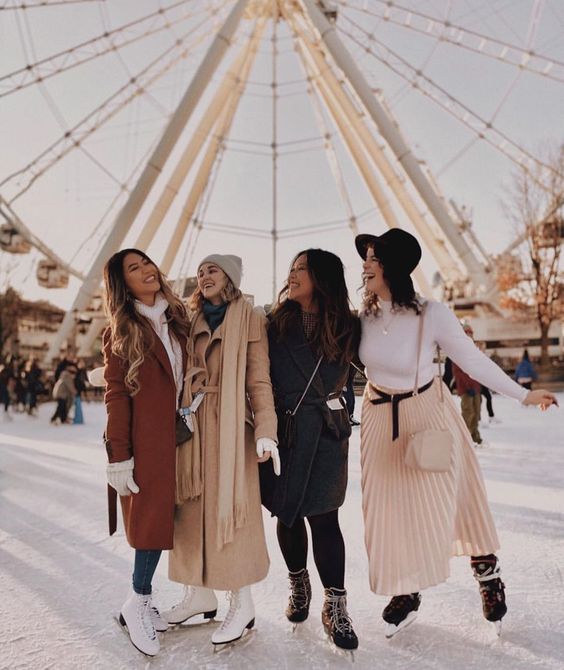 group of women ice skating