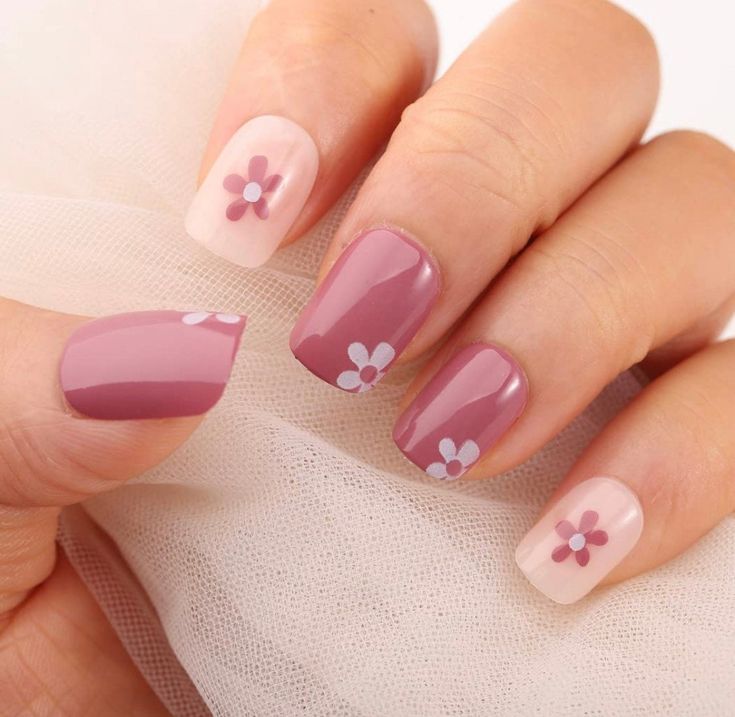 mauve pink manicure with floral design