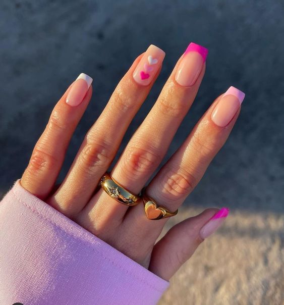 french tip manicure with heart designs