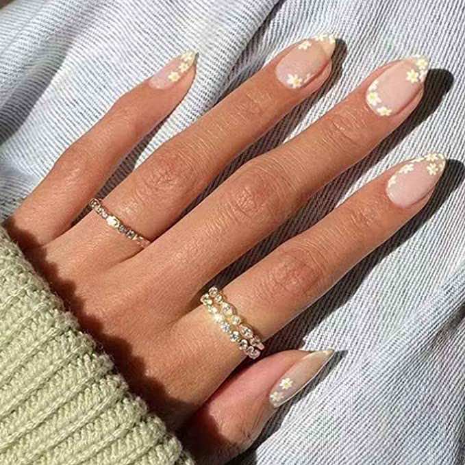 Press on nails with dainty neutral flowers