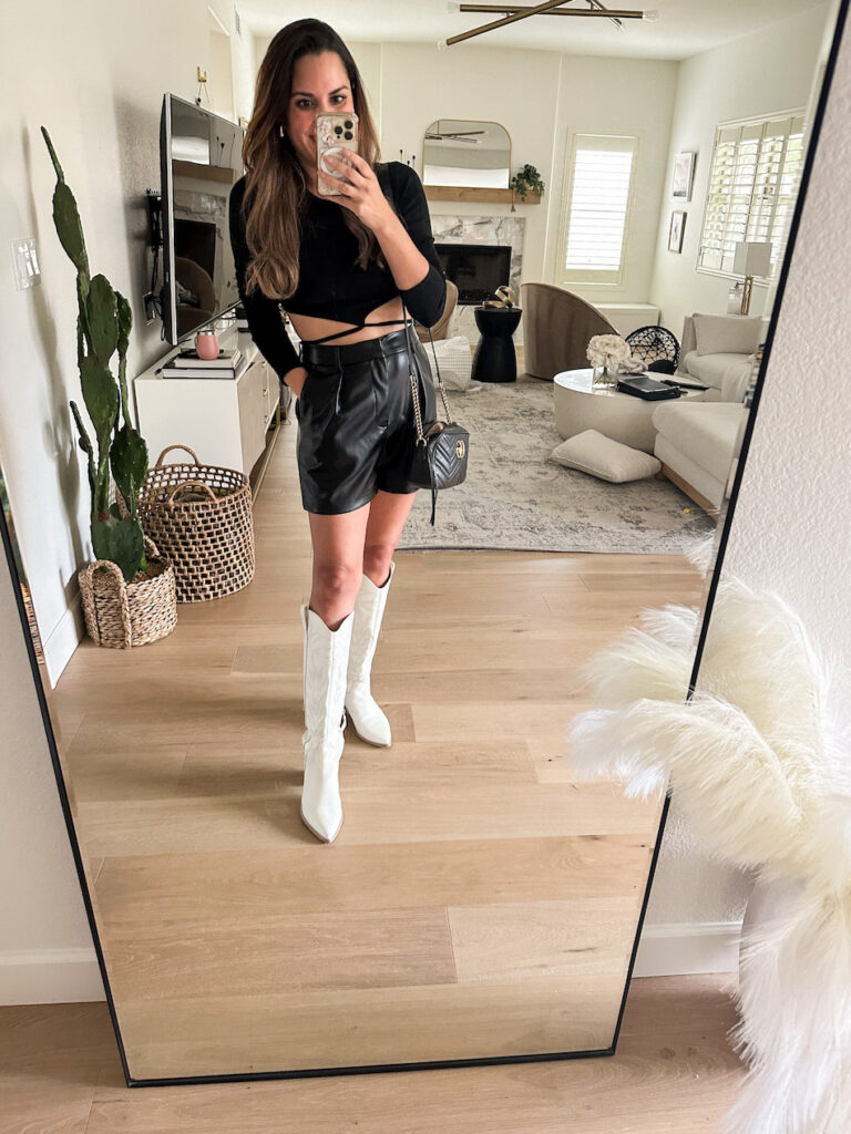 black faux leather shorts white cowboy boots outfit 