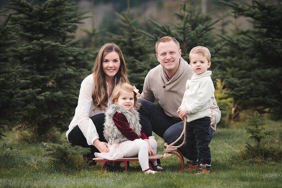 fur and creamy white family photo outfits inspo
