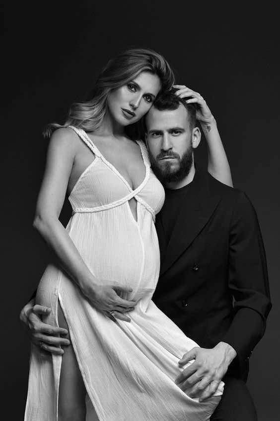 black and white couples maternity photoshoot idea in a studio