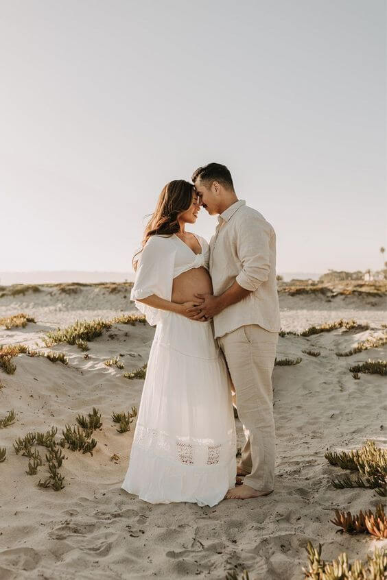 beach couples maternity photoshoot idea