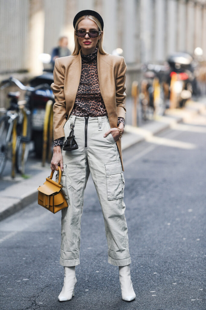 woman wearing cargo pants with ankle boots