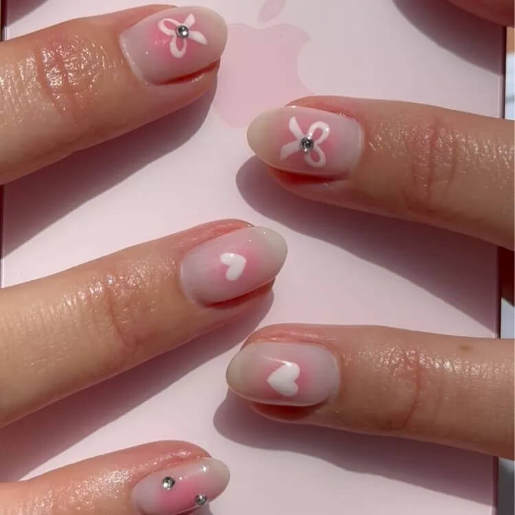 pink cute bow nail inspo